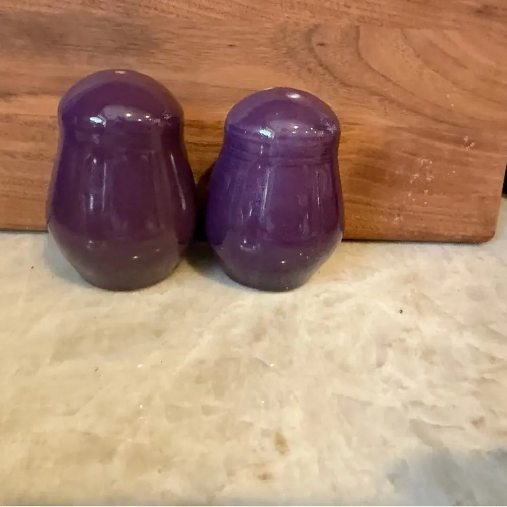 Vintage purple salt and pepper shakers